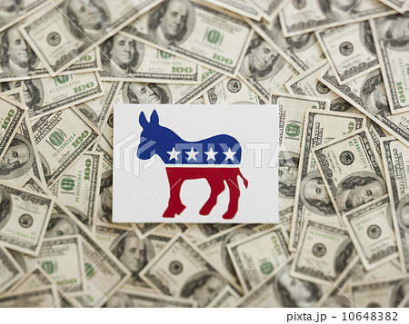 Democratic party symbol wtih US dollars as background Democratic party symbol wtih US dollars as background 10648382