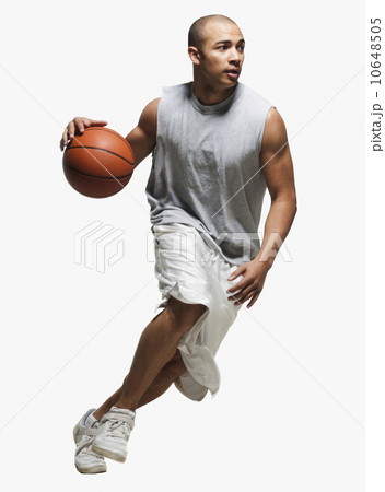 Basketball player dribbling 10648505