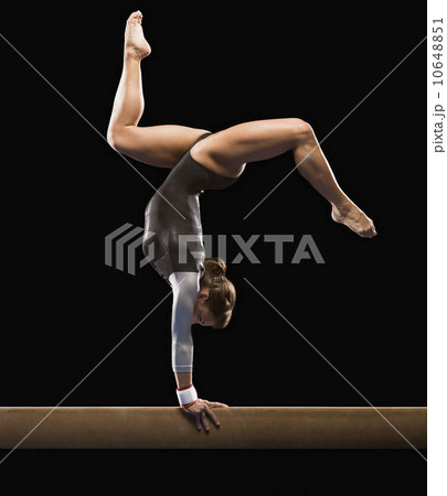 Gymnast on balance beam Gymnast on balance beam 10648851