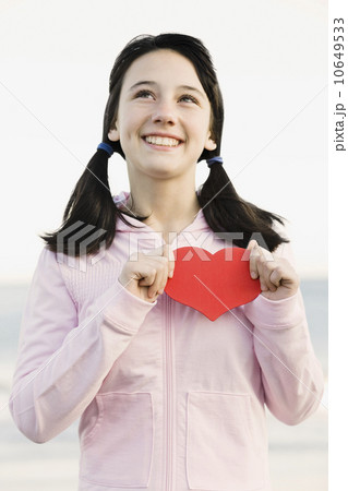 Young girl holding heart Young girl holding heart 10649533
