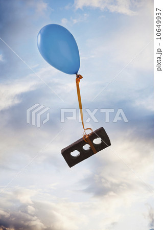 Balloon tied to a brick 10649937