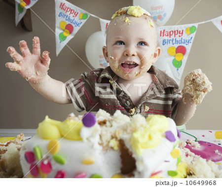Baby covered in birthday cake Baby covered in birthday cake 10649968