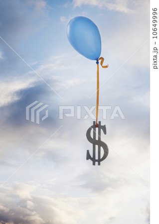 Balloon tied to a dollar symbol Balloon tied to a dollar symbol 10649996