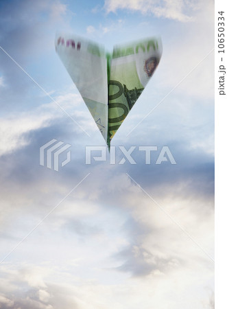 Paper airplane made out of money 10650334
