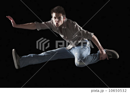 Male dancer jumping in the air Male dancer jumping in the air 10650532