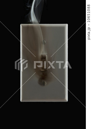 Smoke emanating from an electrical switch 10651088