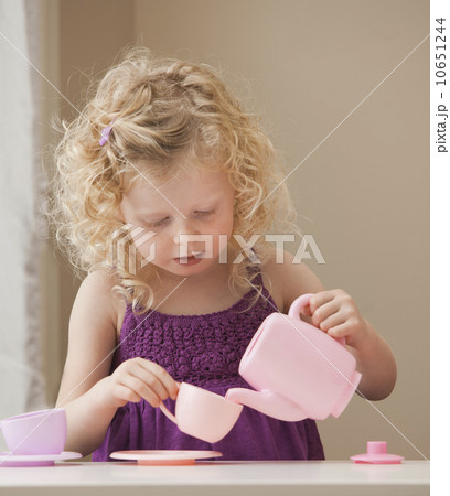 USA, Utah, Lehi, girl (2-3) playing with toy crockery  10651244
