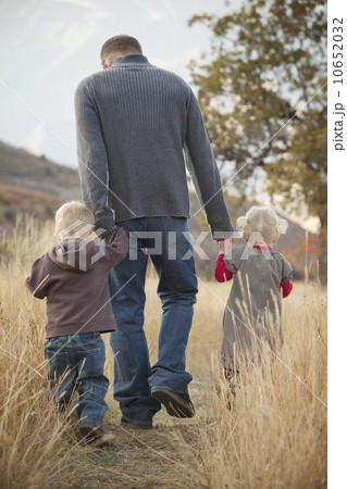 Family walking in a meadow 10652032