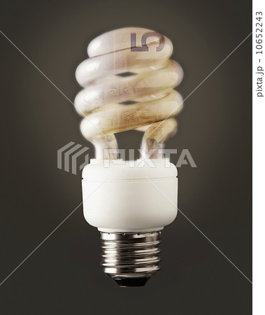 Composition of energy efficient bulb and five canadian dollar banknote Composition of energy efficient bulb and five canadian dollar banknote 10652243
