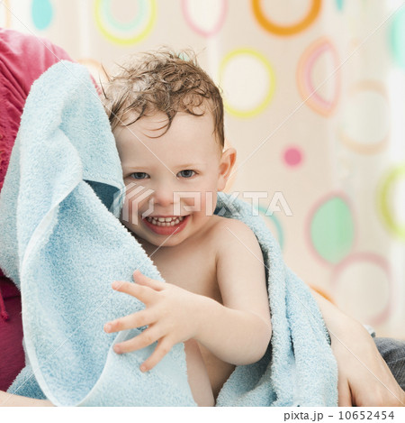 USA, Utah, Lehi, mother with son (2-3) wrapped in towel USA, Utah, Lehi, mother with son (2-3) wrapped in towel 10652454