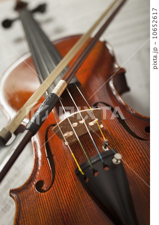 Close-up of violin on sheet music 10652617