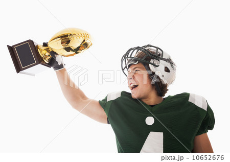 Portrait of American football player celebrating victory 10652676