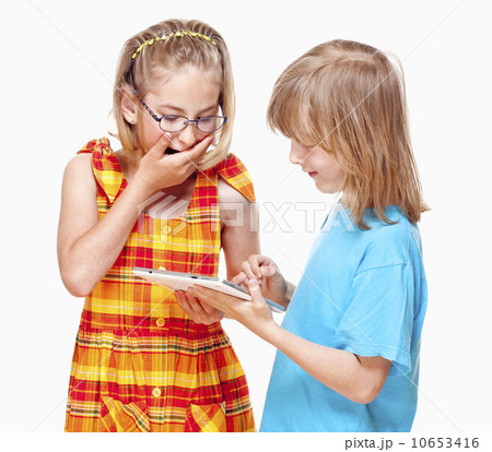 Two Children Having Fun with Digital Tablet Two Children Having Fun with Digital Tablet 10653416