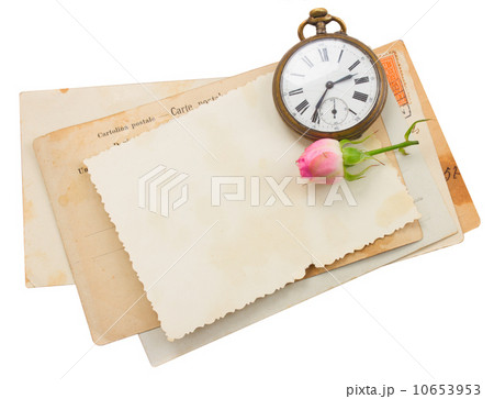 bunch of old papers with antique clock 10653953