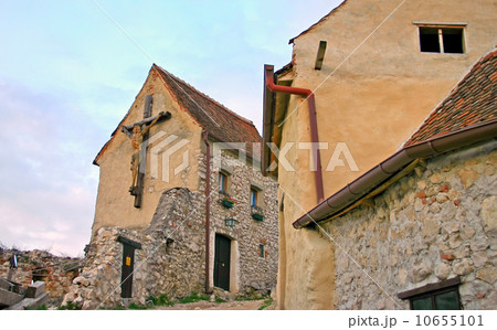 cross with a crucifix on a brick wall 10655101