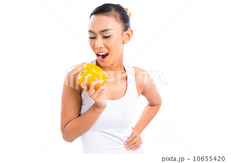 Asian woman eating and living healthy Asian woman eating and living healthy 10655420