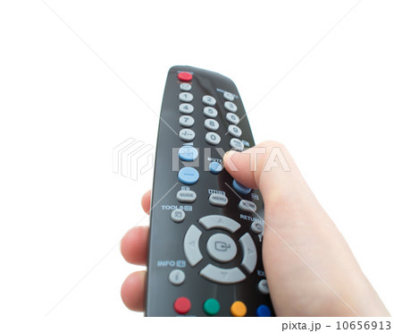 TV remote control in hand isolated on white TV remote control in hand isolated on white 10656913
