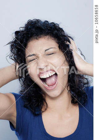 Portrait of teenage girl (16-17), studio shot Portrait of teenage girl (16-17), studio shot 10658658