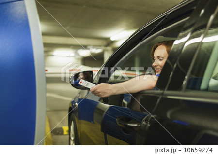 Young woman parking car 10659274