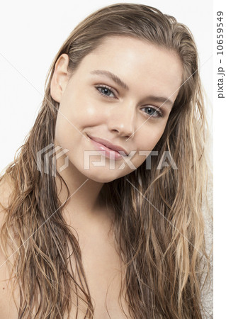 Portrait of young woman with wet hair Portrait of young woman with wet hair 10659549