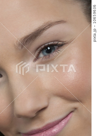 Close-up of smiling female face Close-up of smiling female face 10659636