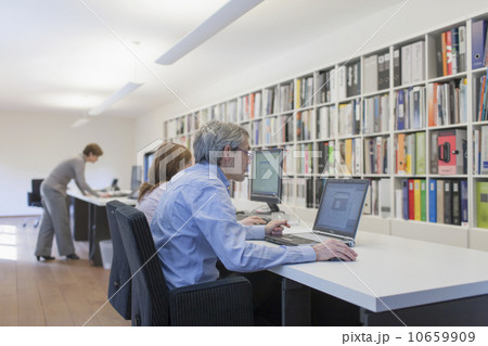 Employees of design agency at work Employees of design agency at work 10659909