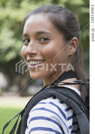 Portrait of young woman with backpack Portrait of young woman with backpack 10659963