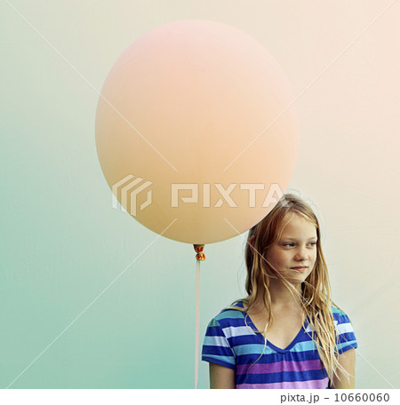 Texas, Austin, Blonde girl holding big balloon Texas, Austin, Blonde girl holding big balloon 10660060
