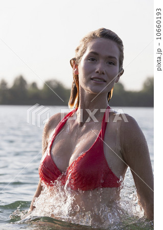 Woman relaxing in lake, Looking at camera Woman relaxing in lake, Looking at camera 10660193