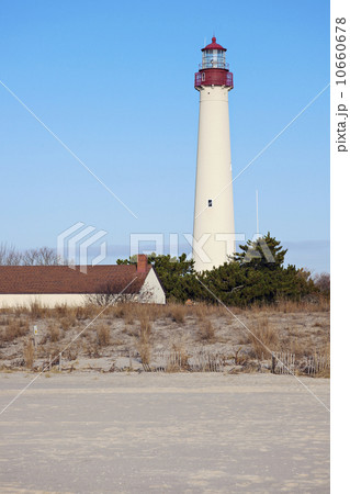 Lighthouse on beach Lighthouse on beach 10660678