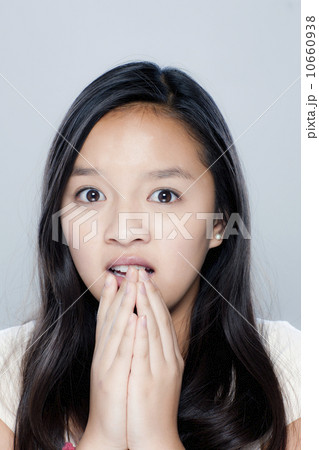 Portrait of teenage girl (14-15), studio shot Portrait of teenage girl (14-15), studio shot 10660938