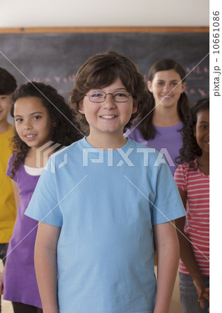 Portrait of pupils (10-11, 12-13) with blackboard in background Portrait of pupils (10-11, 12-13) with blackboard in background 10661086