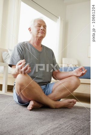 Senior man meditating 10661204