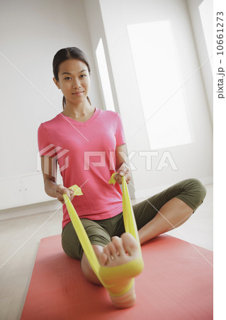 Young woman exercising Young woman exercising 10661273