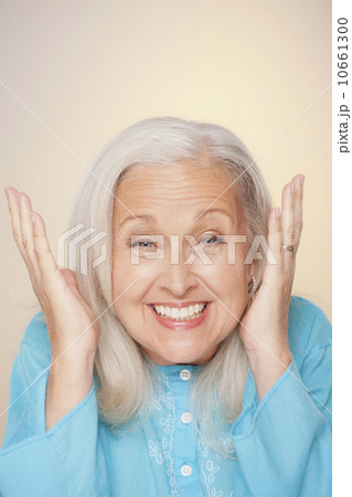 Portrait of senior woman with surprise face expression Portrait of senior woman with surprise face expression 10661300