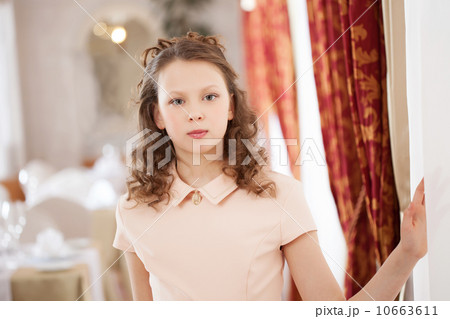Portrait of elegant cute girl posing in restaurant Portrait of elegant cute girl posing in restaurant 10663611