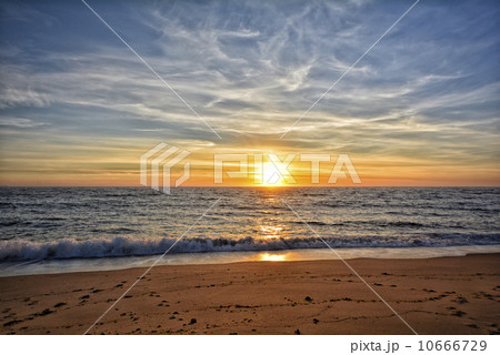 Beautiful sunset above the sea 10666729