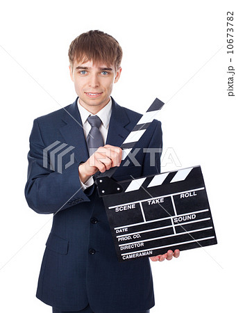 young smiling businessman with clapperboard isolated on white ba young smiling businessman with clapperboard isolated on white ba 10673782