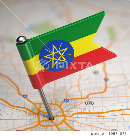 Ethiopia Small Flag on a Map Background. 10674075