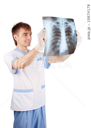 medical doctor looking at x-ray picture of lungs isolated on whi 10674178