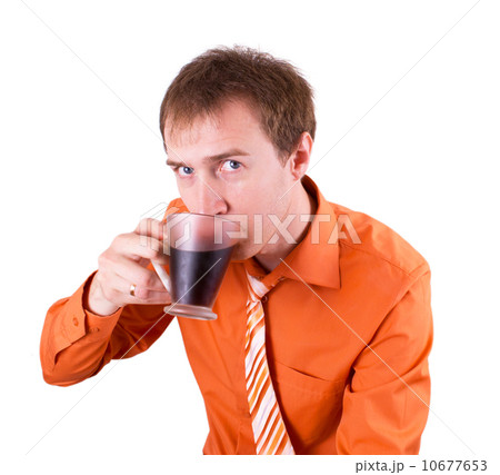 Young man drinking coffee on a white Young man drinking coffee on a white 10677653