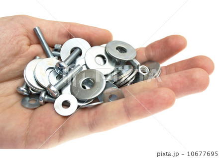 hand with a washer, nut, screw 10677695