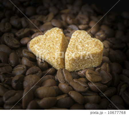 Coffee Beans, Pots, Cinnamon on Dark Background 10677768