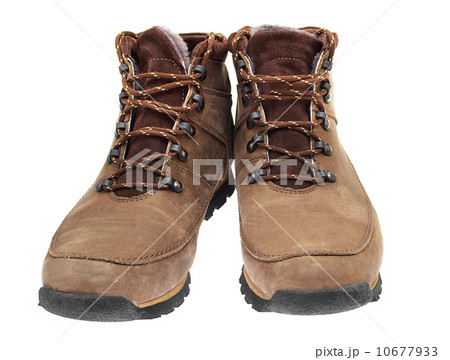 A pair of new boots on white background A pair of new boots on white background 10677933