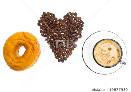Cappuccino, donut, brown sugar and coffee beans on white backgro Cappuccino, donut, brown sugar and coffee beans on white backgro 10677980