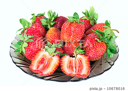 Strawberry berries on plate isolated on white Strawberry berries on plate isolated on white 10678016
