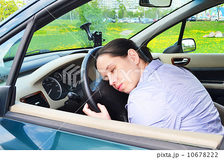 Young girl sleeps in her car. Young girl sleeps in her car. 10678222