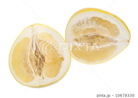Cut a large yellow honey pomelo on white background Cut a large yellow honey pomelo on white background 10678330