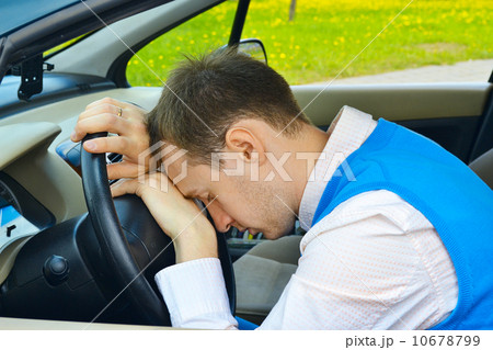 man sleeps in a car man sleeps in a car 10678799