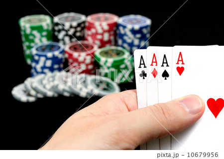 Cards and ultimate poker chips on black Cards and ultimate poker chips on black 10679956